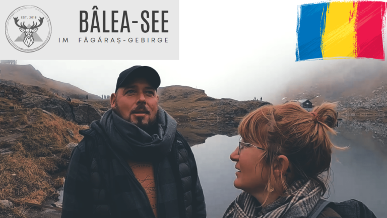 Ein Mann und eine Frau stehen am Balea-See