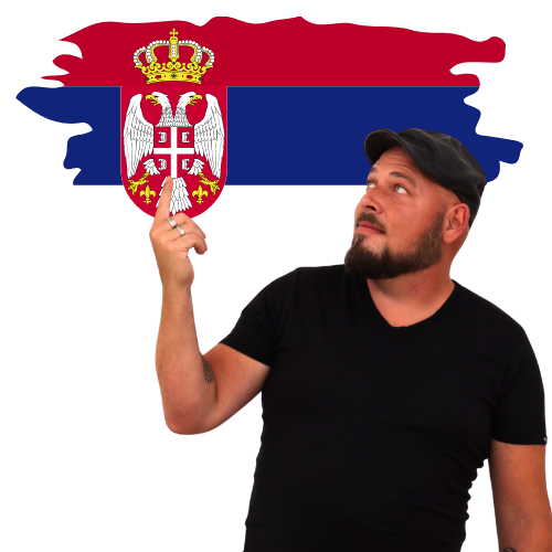 mann mit flatcap zeigt auf die Flagge von Serbien